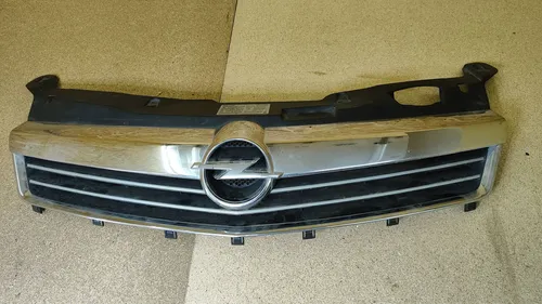 13225775 Opel Astra H Front bumper upper radiator grill